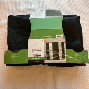 Mainstays Black Embossed Blackout Curtain Set open box,never used, 99% Blackout.